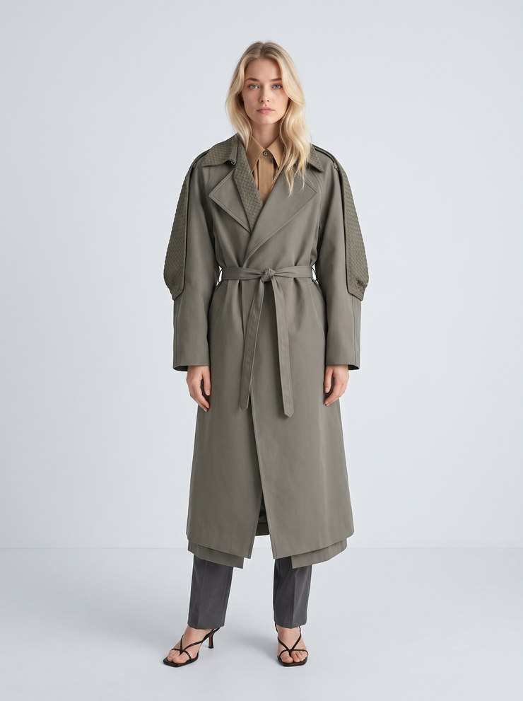 Output: the same trench, belt tied, on a plain studio sweep